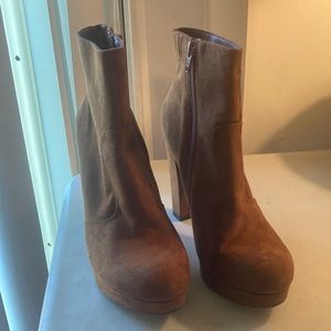 High heeled tan suede platform ankle boots with side zippers